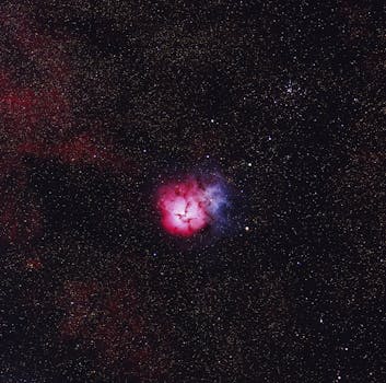 Stunning capture of the Trifid Nebula revealing its vibrant colors and expansive star field.