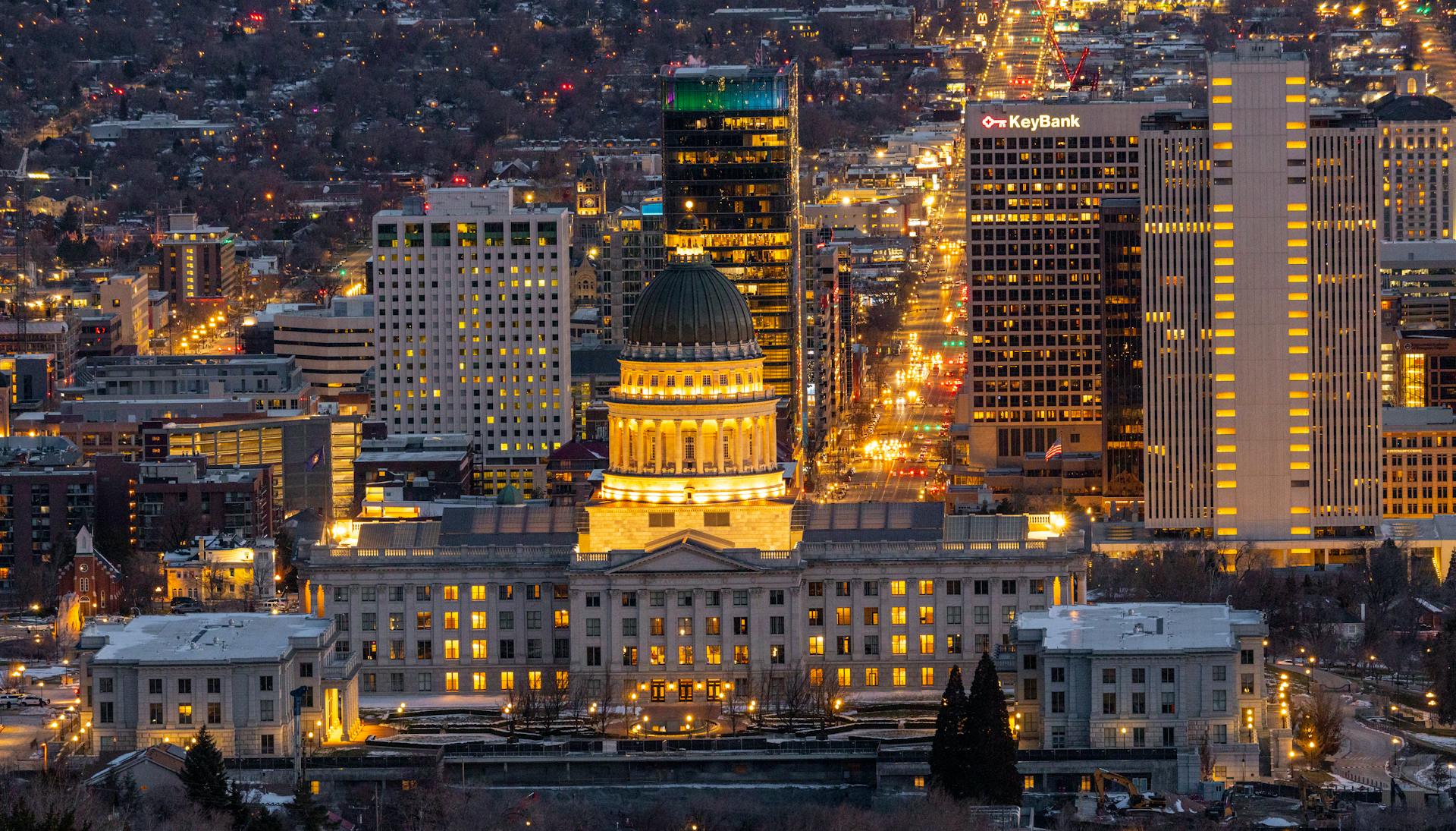 Aerial view of illuminated Salt Lake City with the Utah State Capitol.