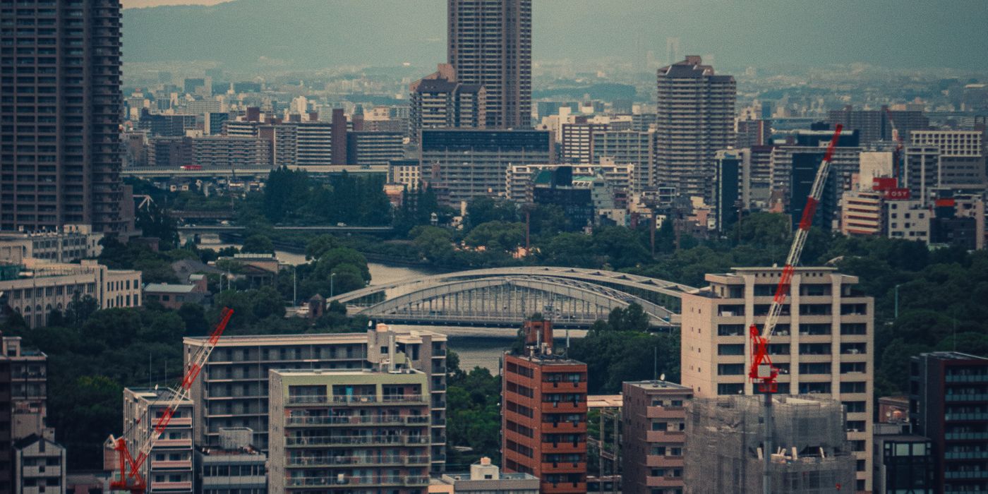 Panoramic view of the Osaka cityscape showing dense urban neighborhoods and high-rise towers