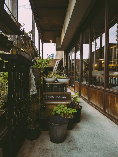 Free Urban alley in Osaka with potted plants and a rustic vibe. A cozy, inviting space. Stock Photo