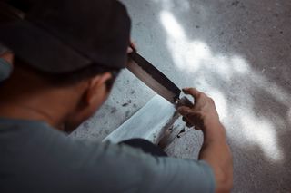 Video thumbnail — sharpening a blade on a whetstone, photo by HONG SON on Pexels