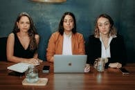 Professional Business Meeting with Three Female Executives