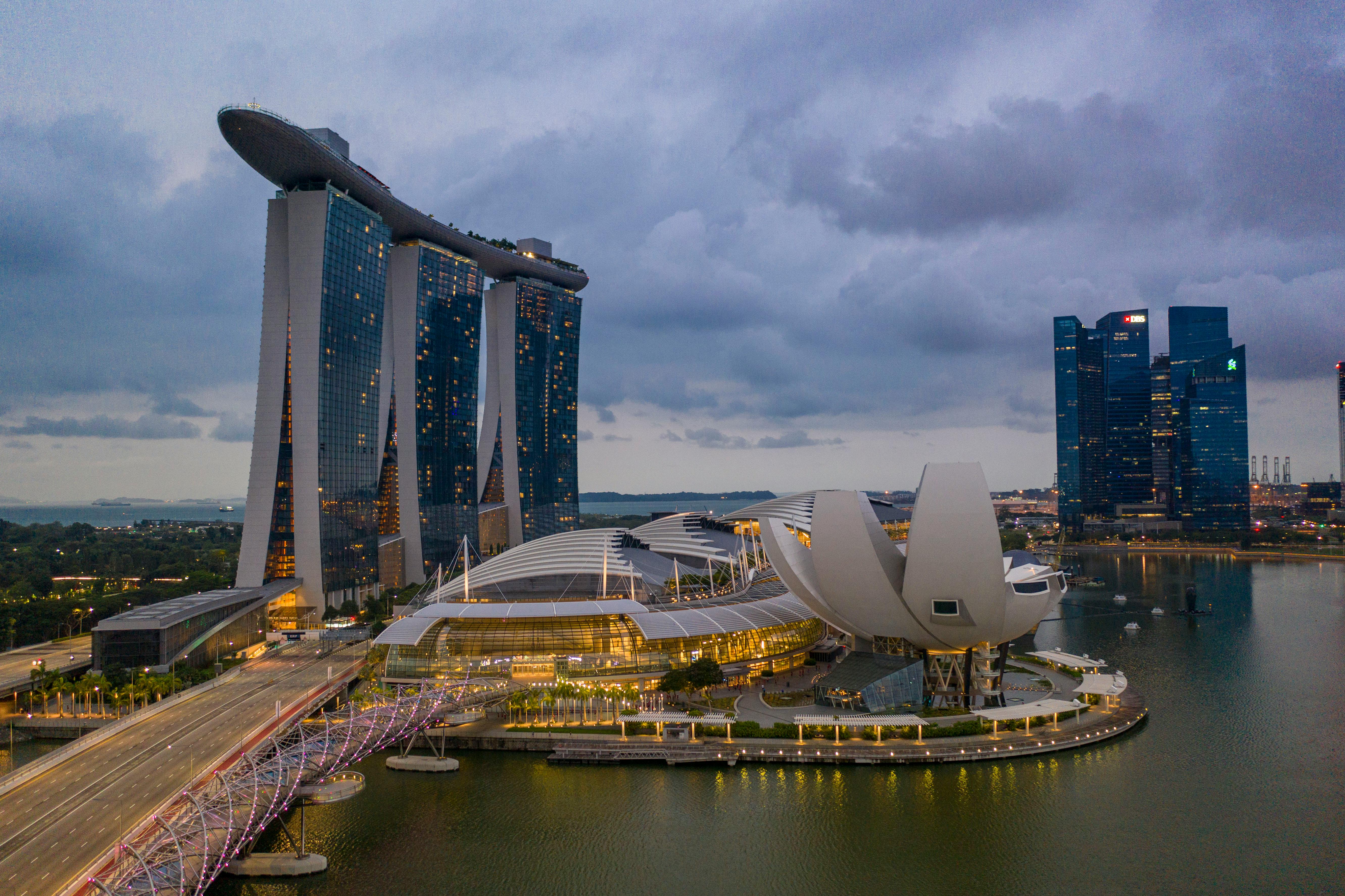 Panoramic view of Singapore skyline from Marina Bay Sands SkyPark observation deck at sunset