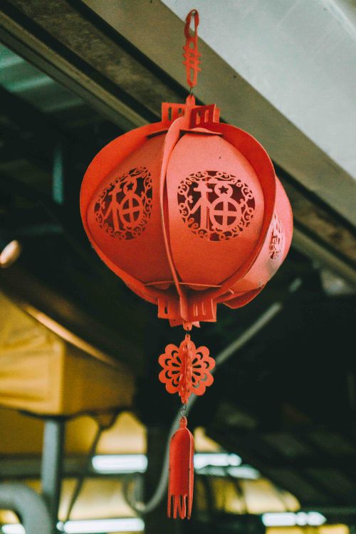 Free Vibrant red Chinese lantern hanging in Kuala Lumpur, Malaysia, showcasing cultural elegance. Stock Photo