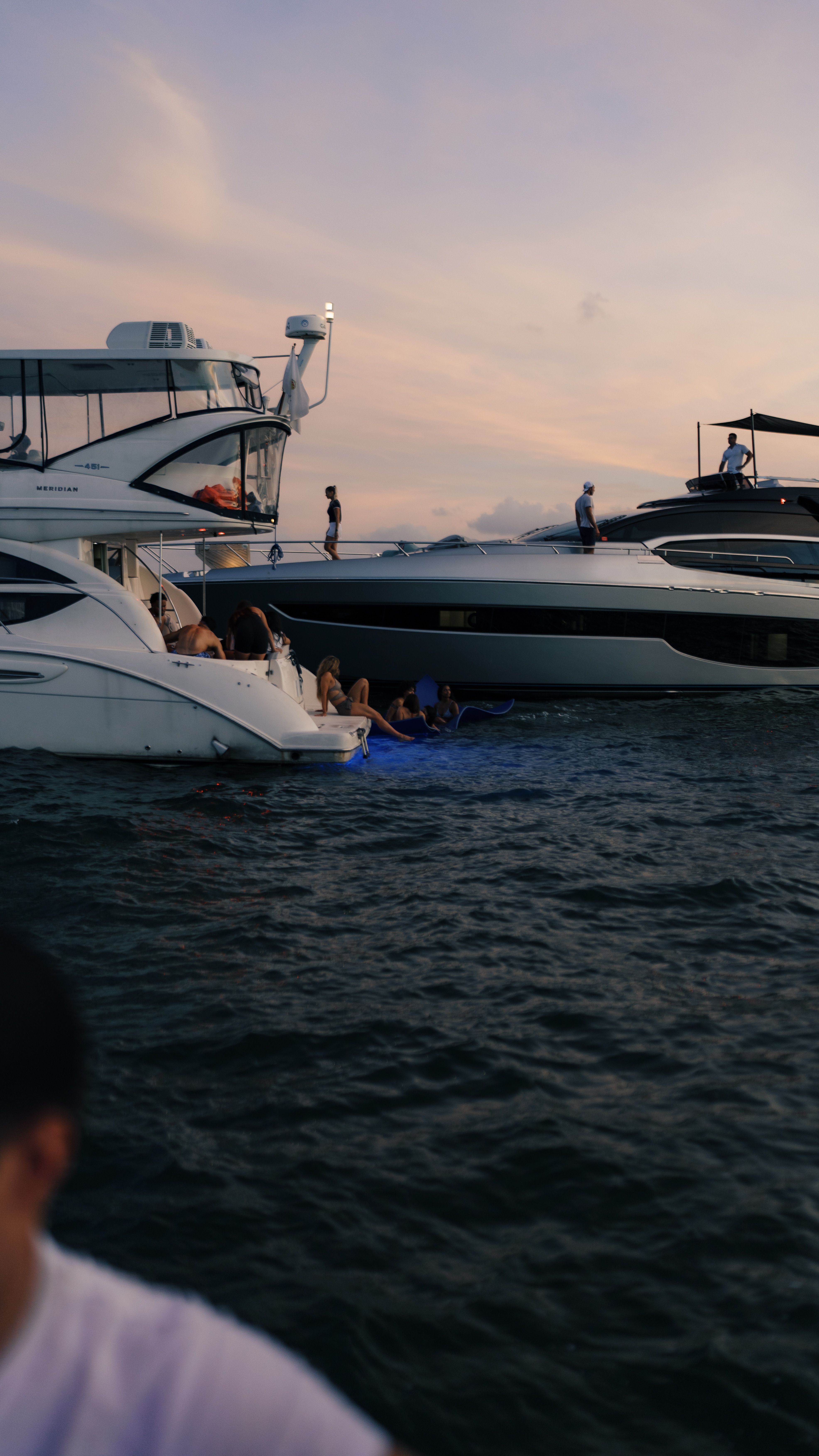 View of Yachts on a Body of Water at Sunset · Free Stock Photo