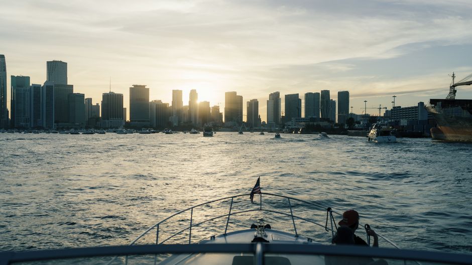 Stunning Yacht Rental 60 ft | + 2 Free Jet Skis | Miami Beach | Sea Pool Review 2026 - Enjoy a serene boat ride with Miami's iconic skyline at sunset, offering a perfect urban escape.