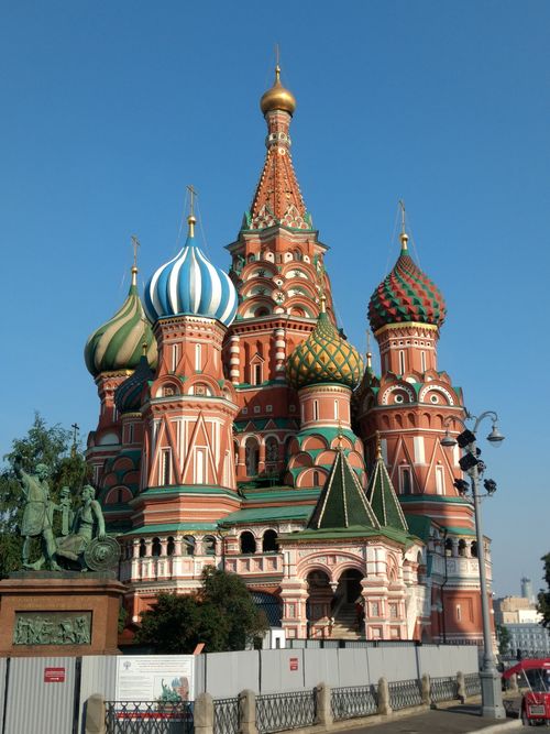 Free Iconic view of St. Basil's Cathedral with vibrant colors under a clear sky in Moscow. Stock Photo
