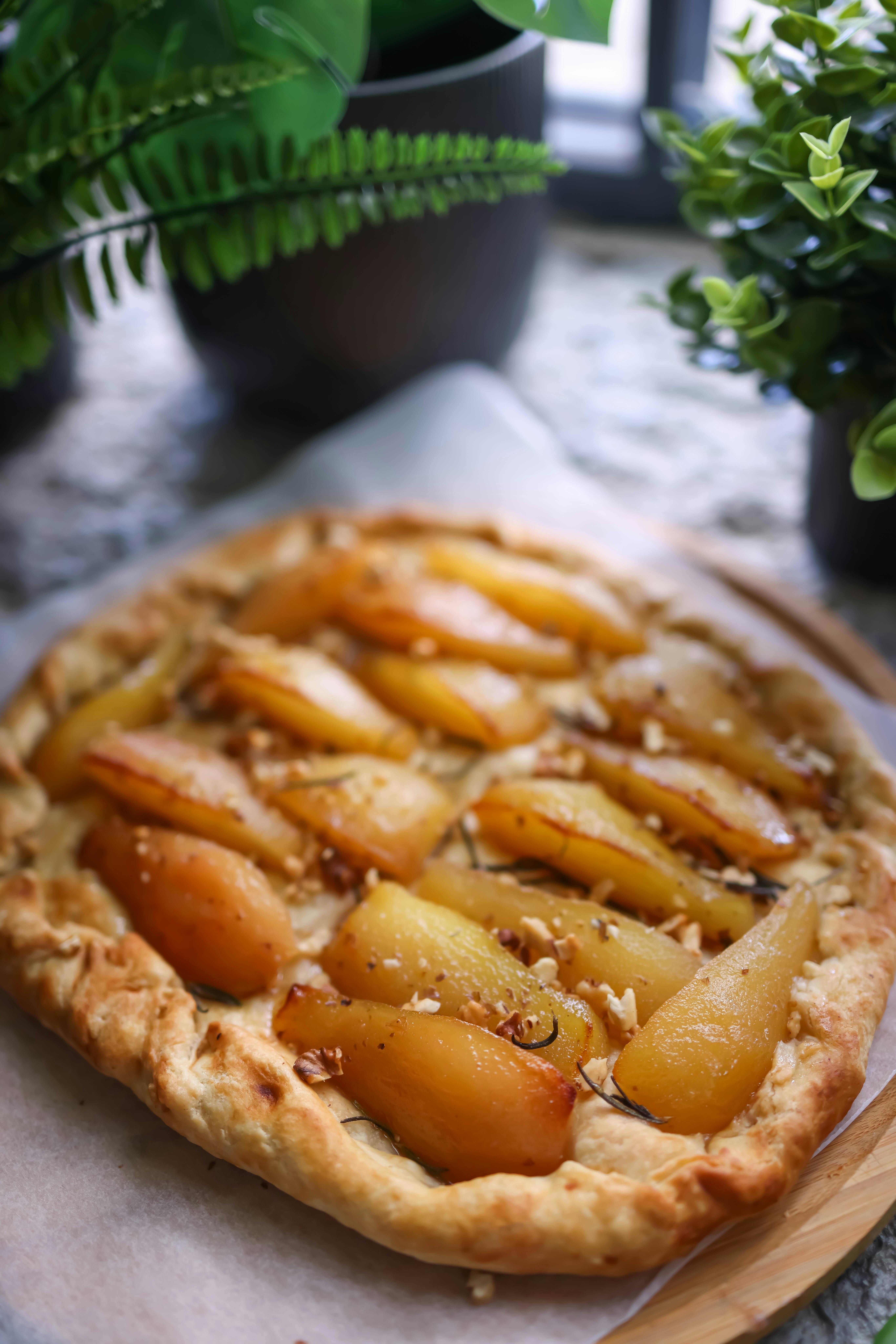 A perfectly baked fruit pie with a golden-brown, flaky crust.