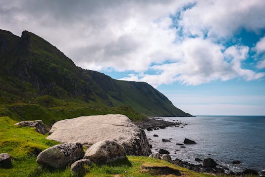Explore the stunning cliffs and blue waters of Eggum, Norway's rugged coastline.