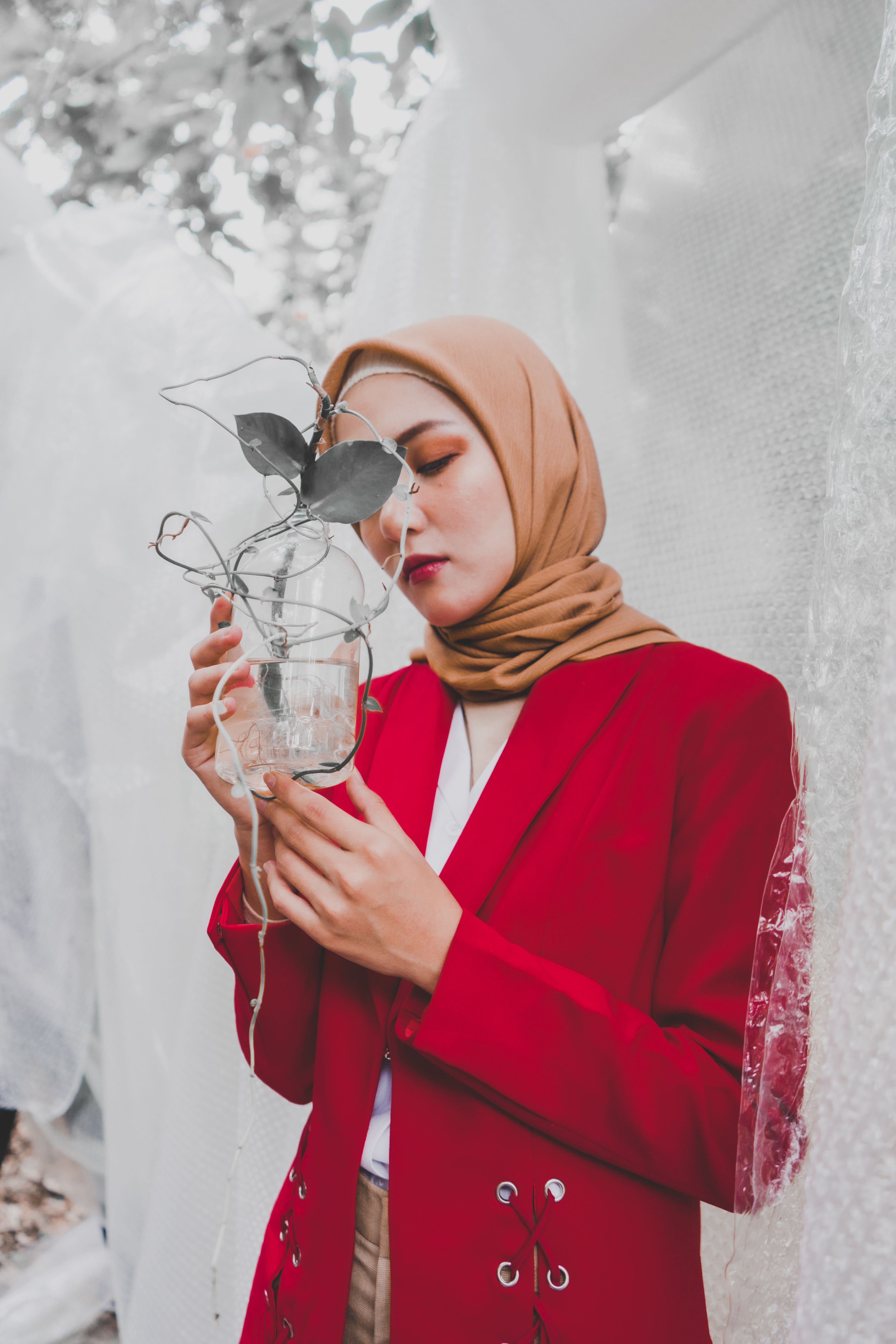 Woman in Brown Hijab and White Brown and White Plaid Long Sleeve Shirt ...