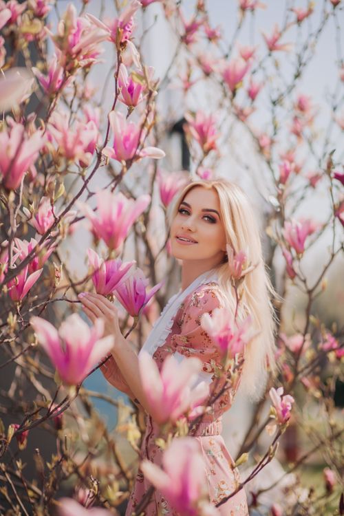 Woman Standing amid Pink Flowers · Free Stock Photo