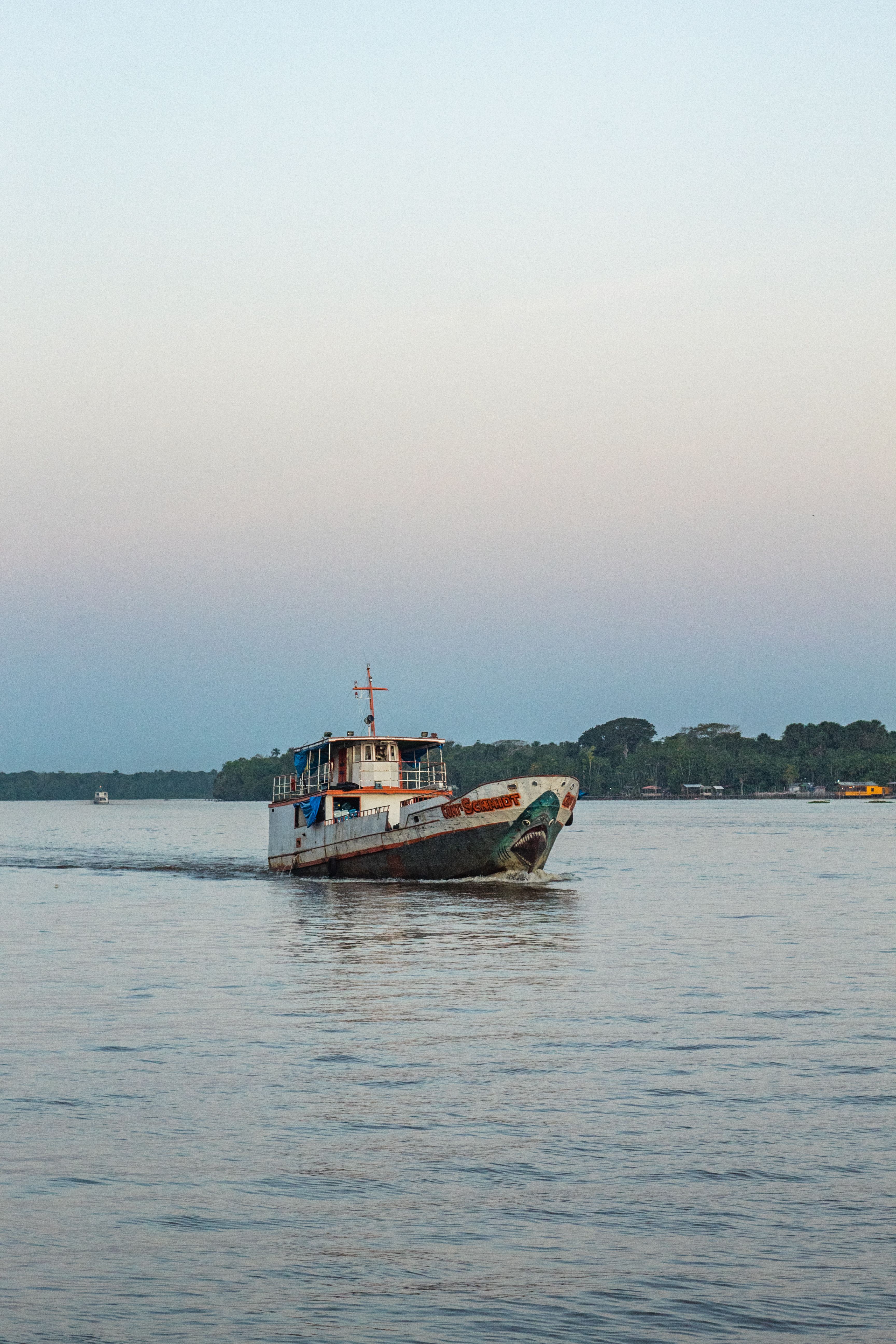A Boat Sailing on a Body of Water · Free Stock Photo