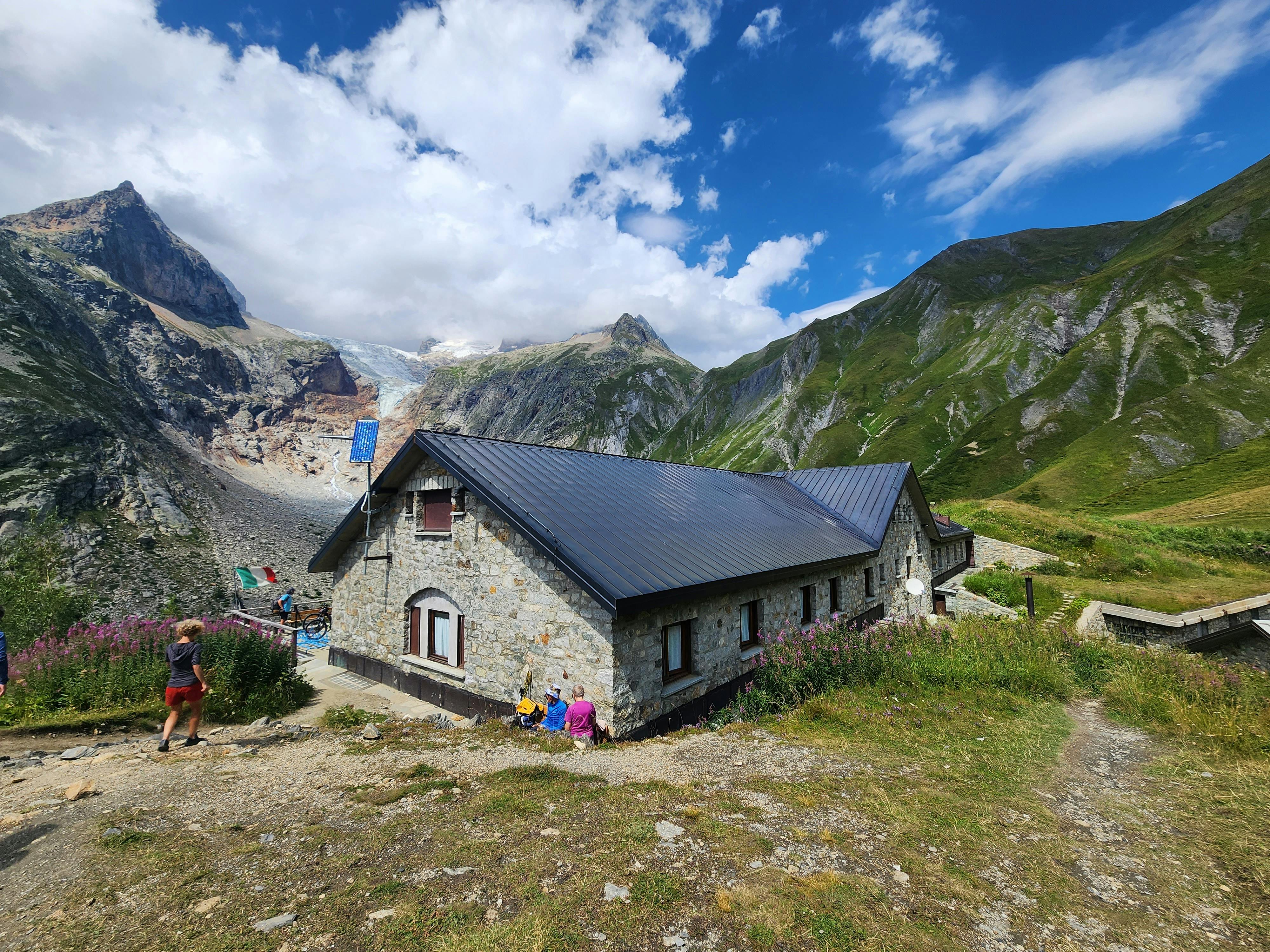 Prescription Goggle Inserts - A picturesque mountain lodge in the Italian Alps surrounded by stunning landscapes.