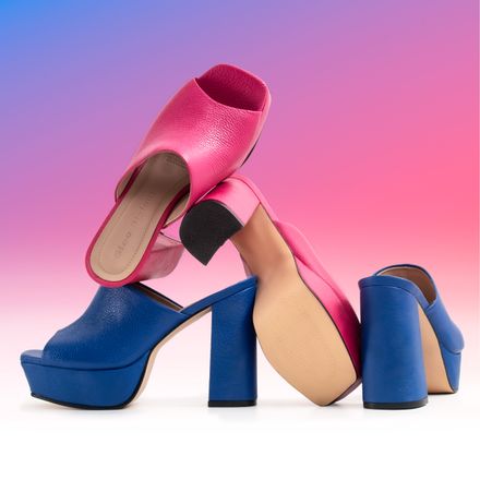 Pink and blue platform sandals on a gradient backdrop — photo by Jose Martin Segura Benites on Pexels