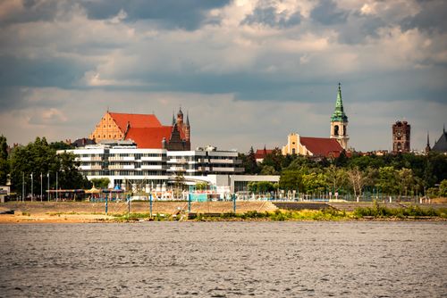 Free Explore the picturesque skyline of Torun with iconic churches and riverside beauty. Stock Photo