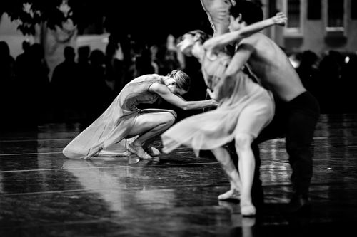 Free Captivating black and white photo of contemporary dancers in motion, evoking emotion on stage. Stock Photo
