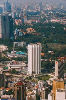 A stunning aerial view of Kuala Lumpur's modern skyline and urban architecture.