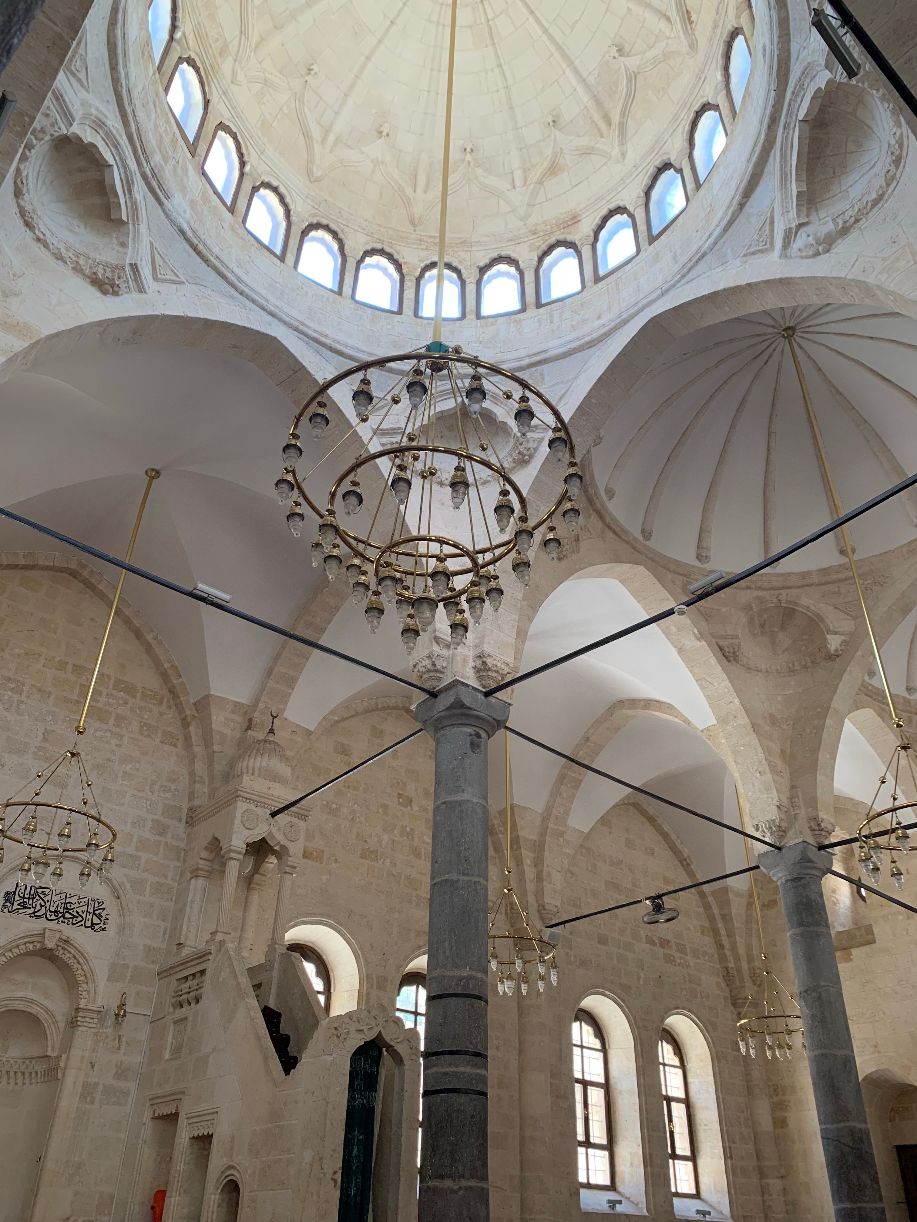 Free Explore this magnificent dome with elegant chandeliers in a historic religious site. Stock Photo
