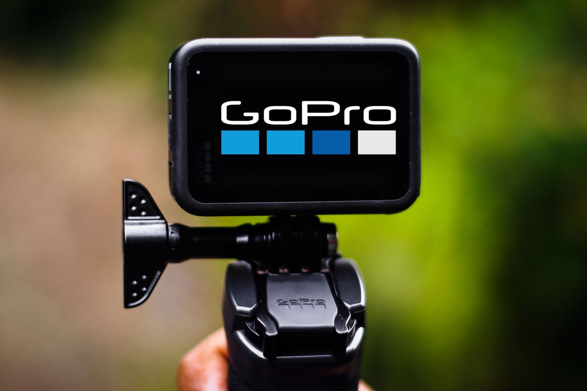 Creator using compact action camera mount outdoors