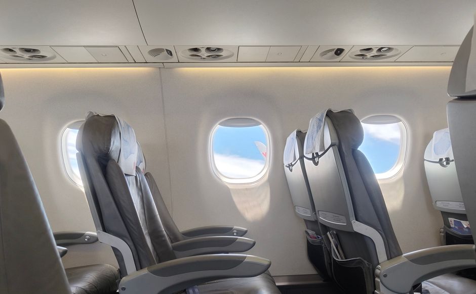 business passenger jet window view clouds luxury