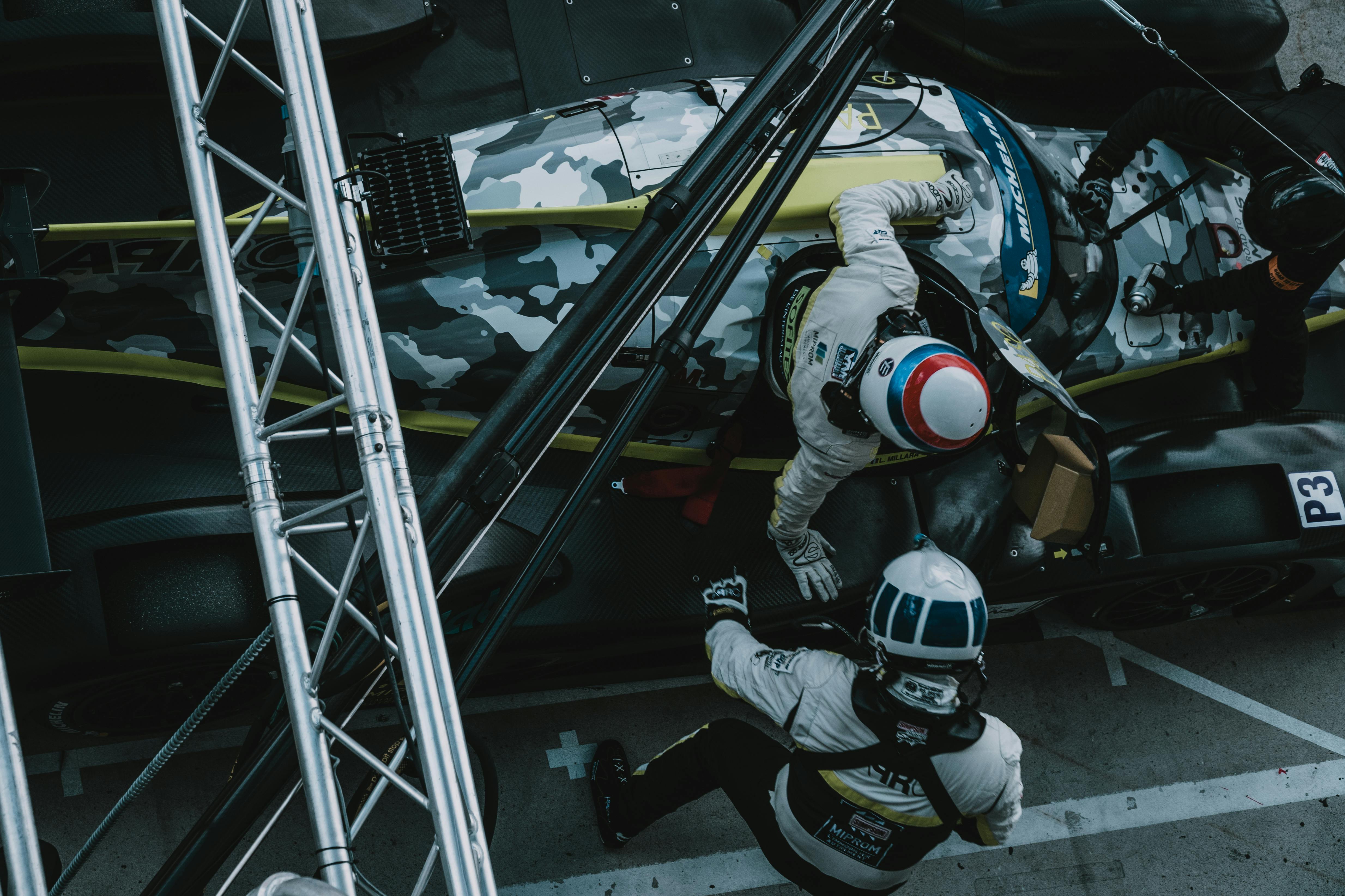 racing driver on a pit stop