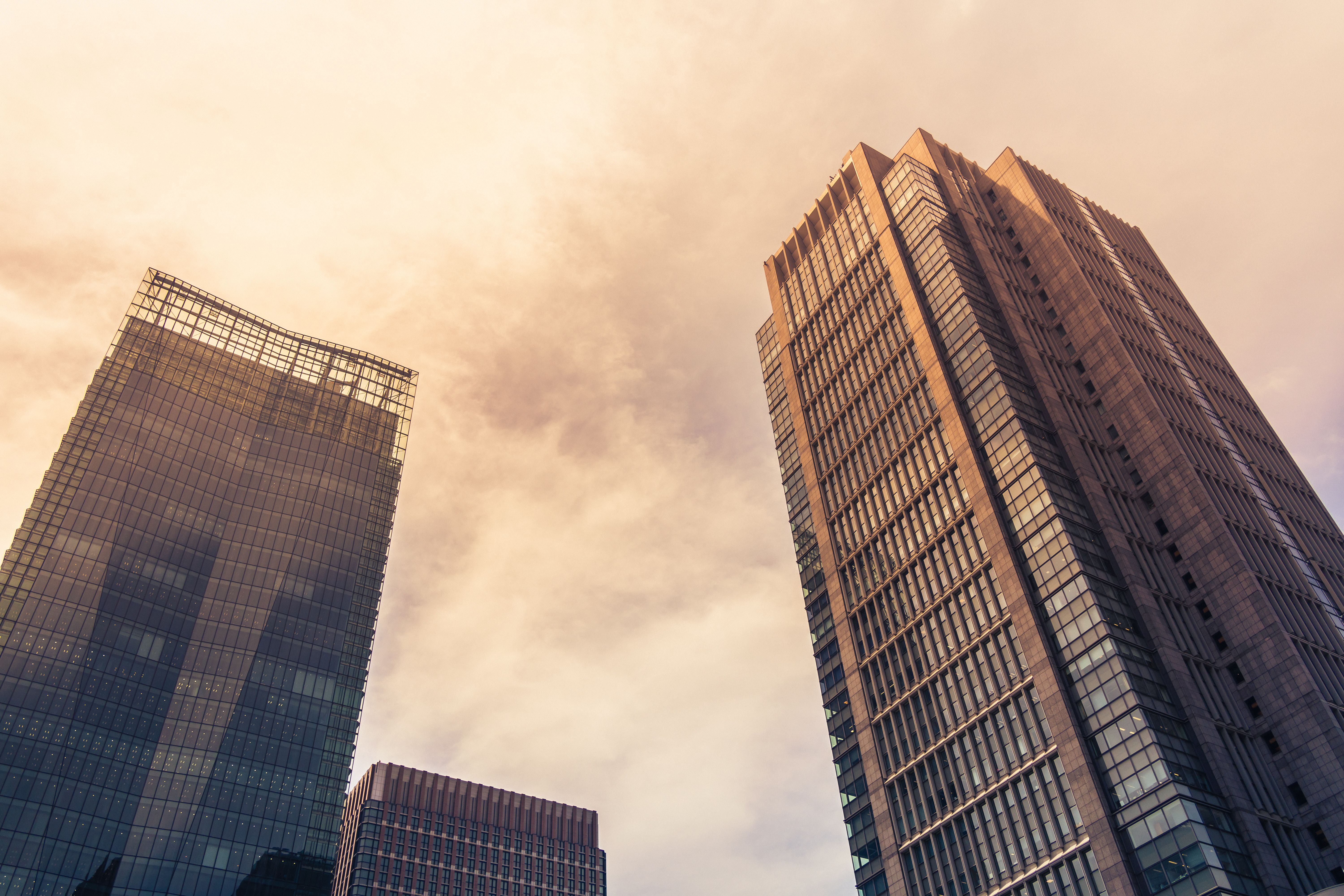 Low Angle Shot of Modern Skyscrapers in a City · Free Stock Photo