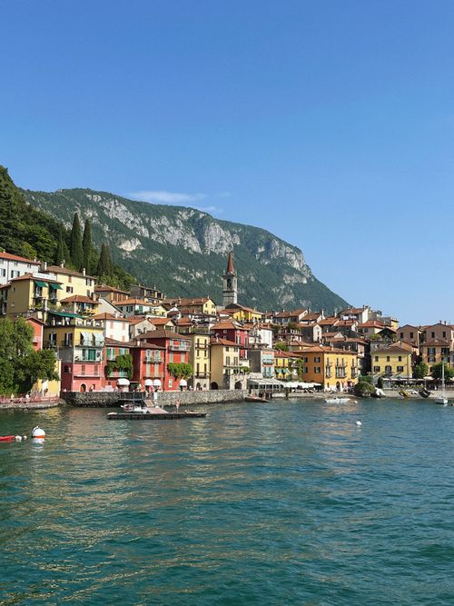 Free Colorful buildings and serene waters define Varenna, a picturesque Italian town on Lake Como. Stock Photo