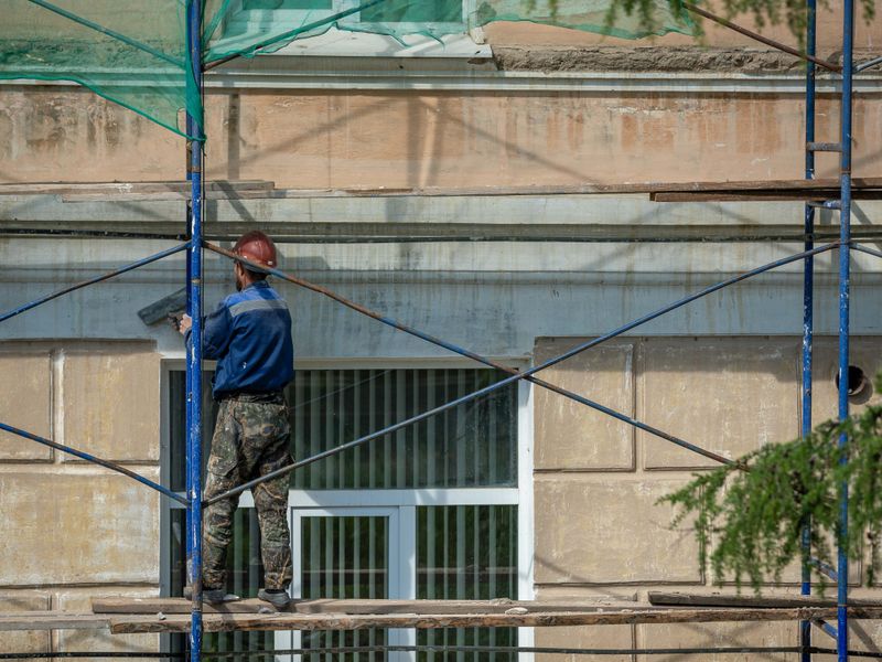 Scaffolding erected against a building facade