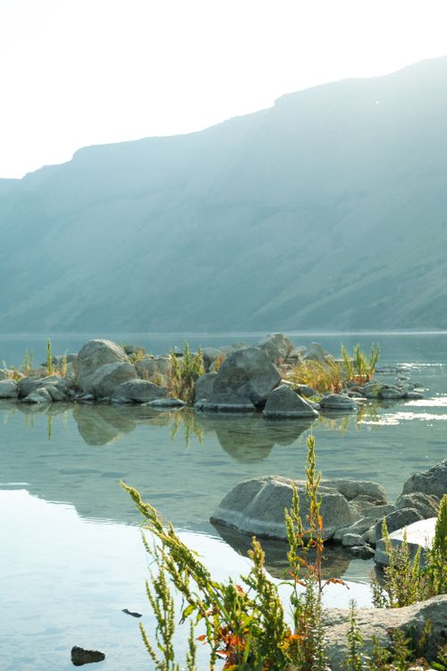 Lake View With Rocks View of Rocks in a Lake in a Mountain Valley · Free Stock Photo