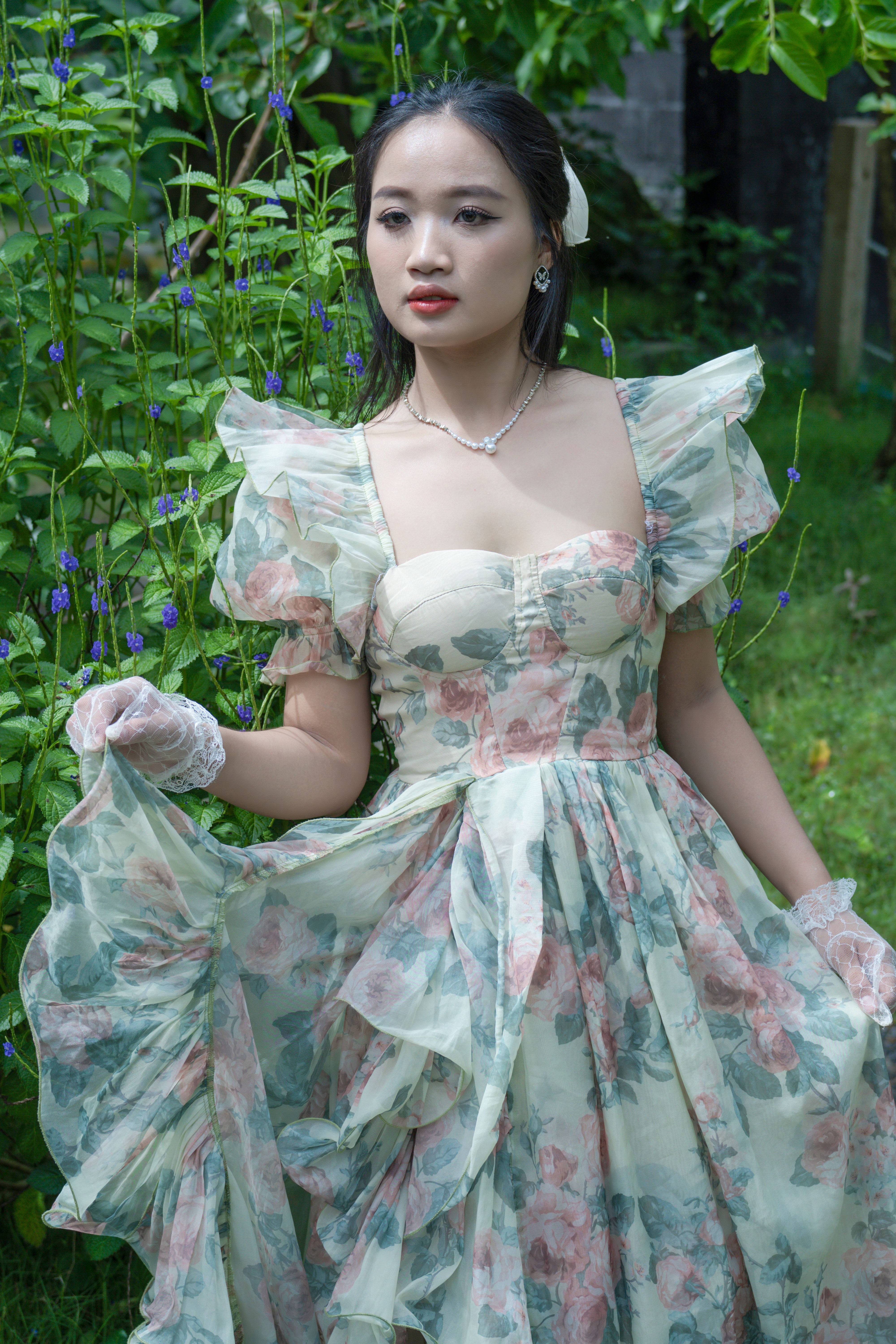 A Woman Posing in a Dress · Free Stock Photo