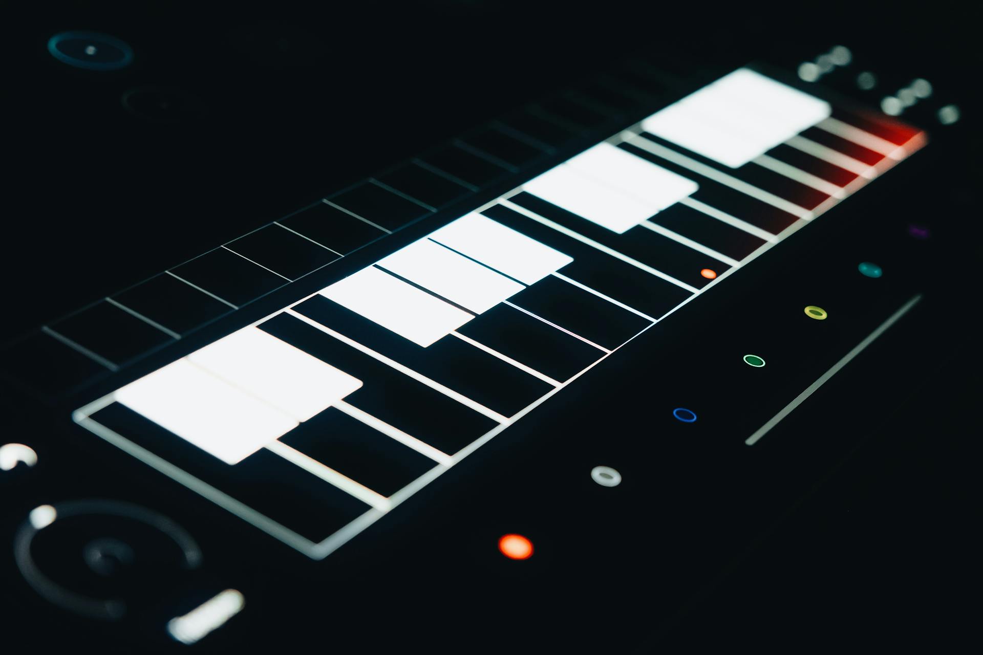 Top view of a modern glowing digital music interface with soft keys, perfect for audio and video production visuals.