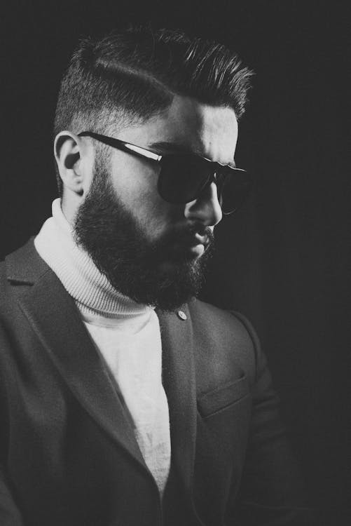 Portrait of a Bearded  Man Wearing a Suit Jacket