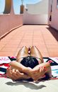 Photo of Woman Sun Bathing