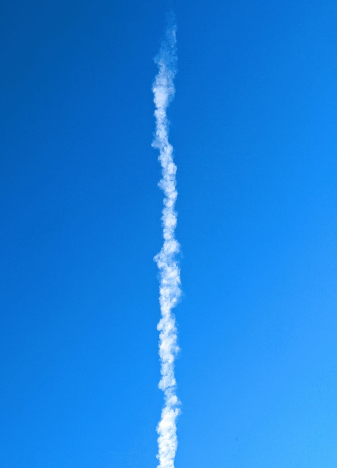 Rocket Fly Over A rocket is flying through the blue sky · Free Stock Photo