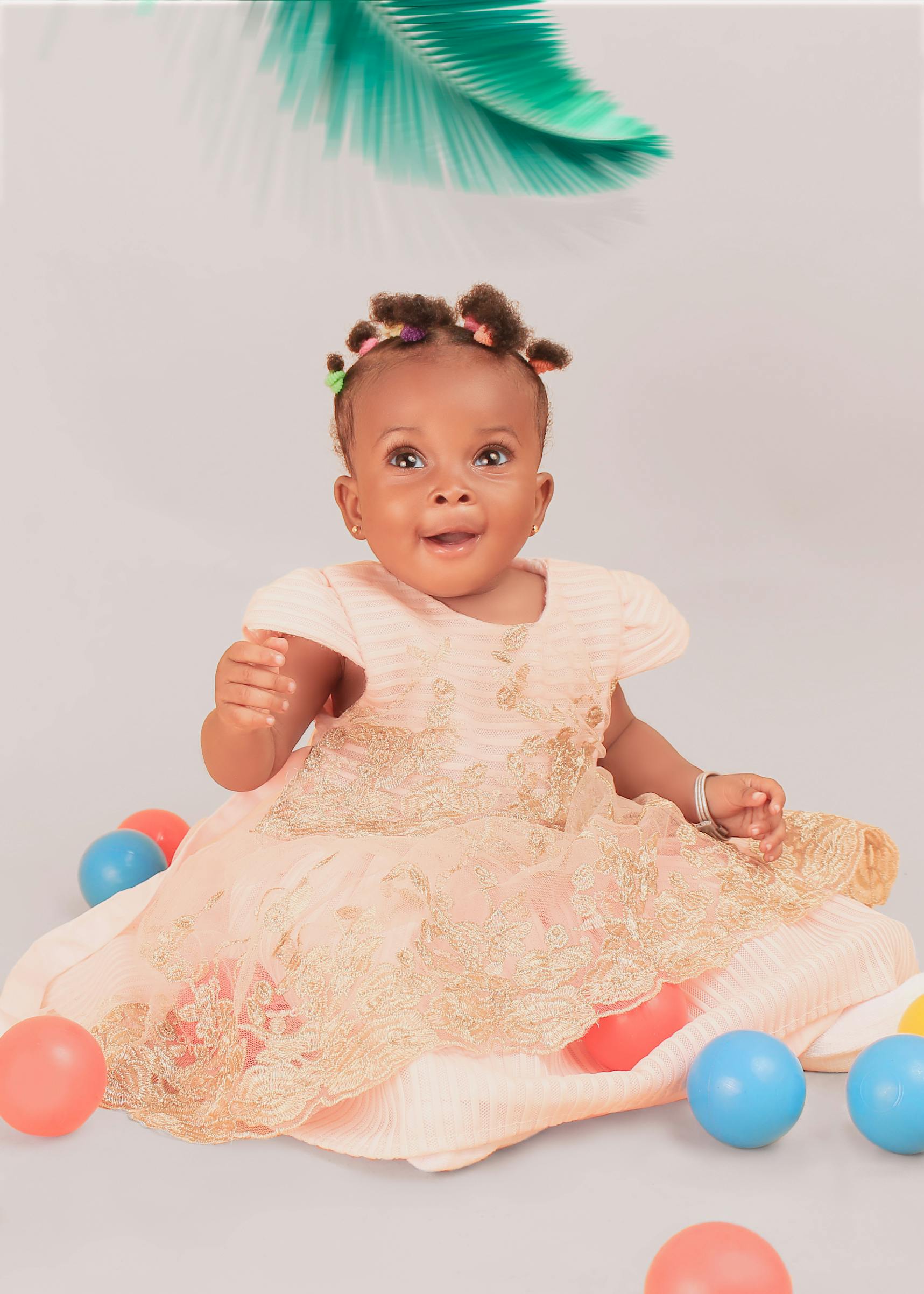 portrait of infant baby girl in dress