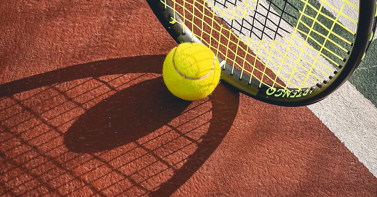 Field Tennis Rackets Tennis Ball and Racket on a Field · Free Stock Photo