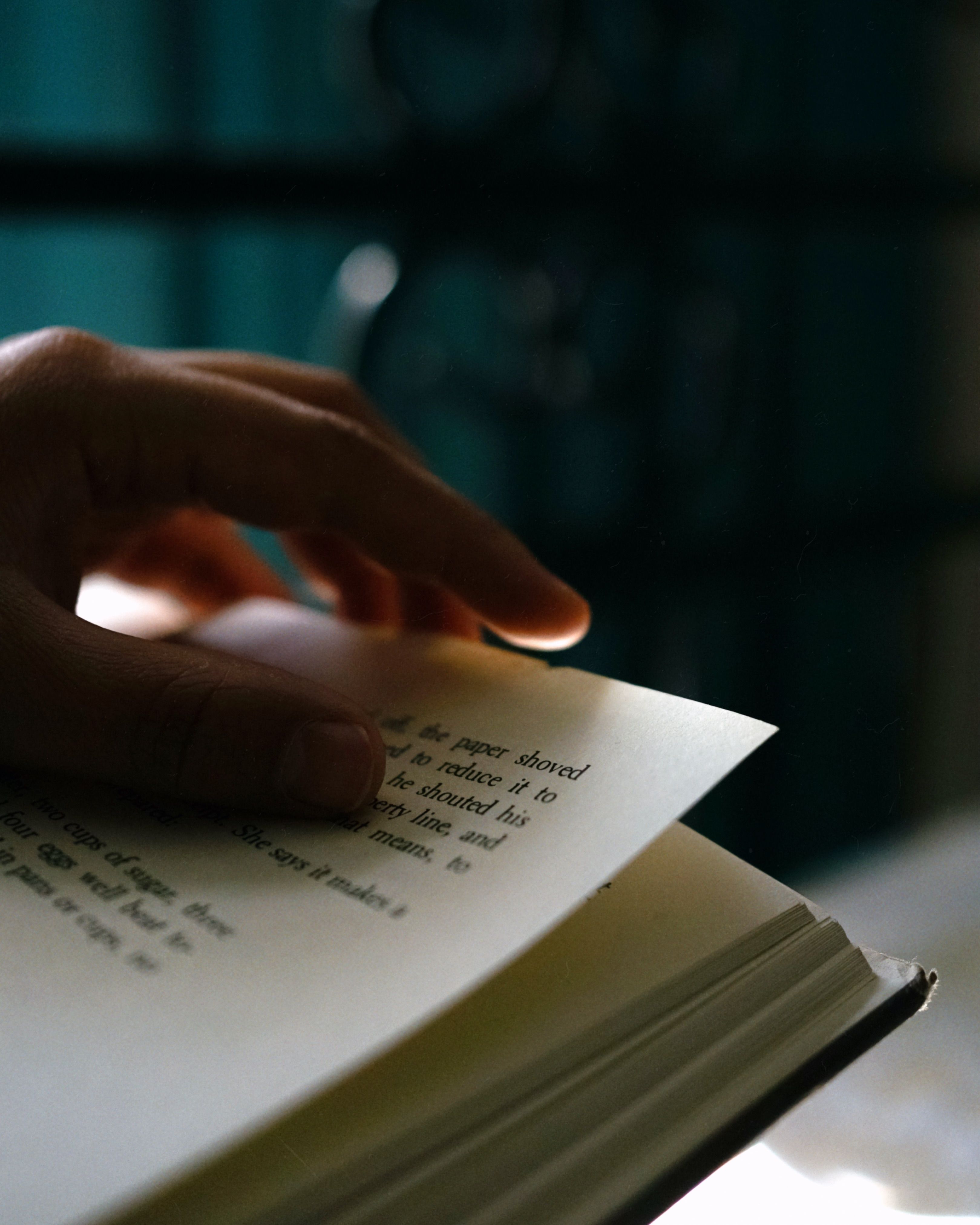 Turning the Pages of a Book · Free Stock Photo