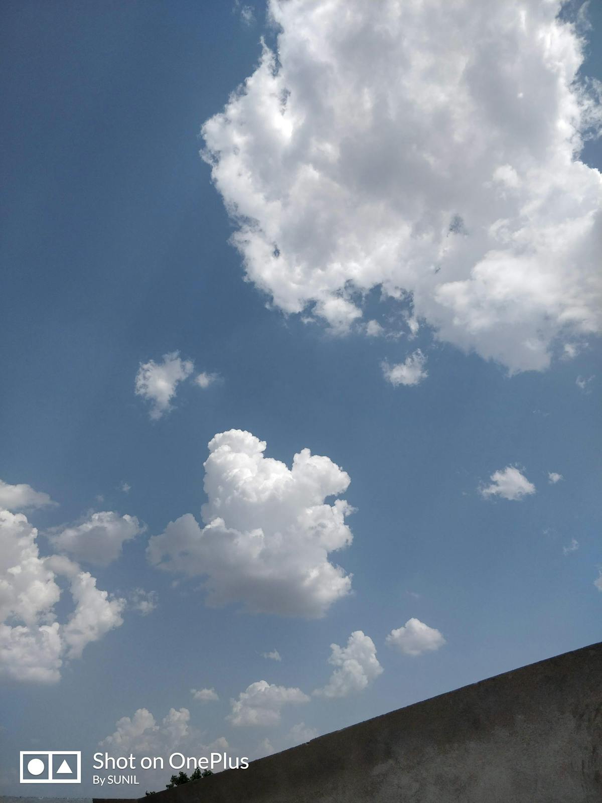 Close-up of a musician holding a microphone on stage with colorful lights