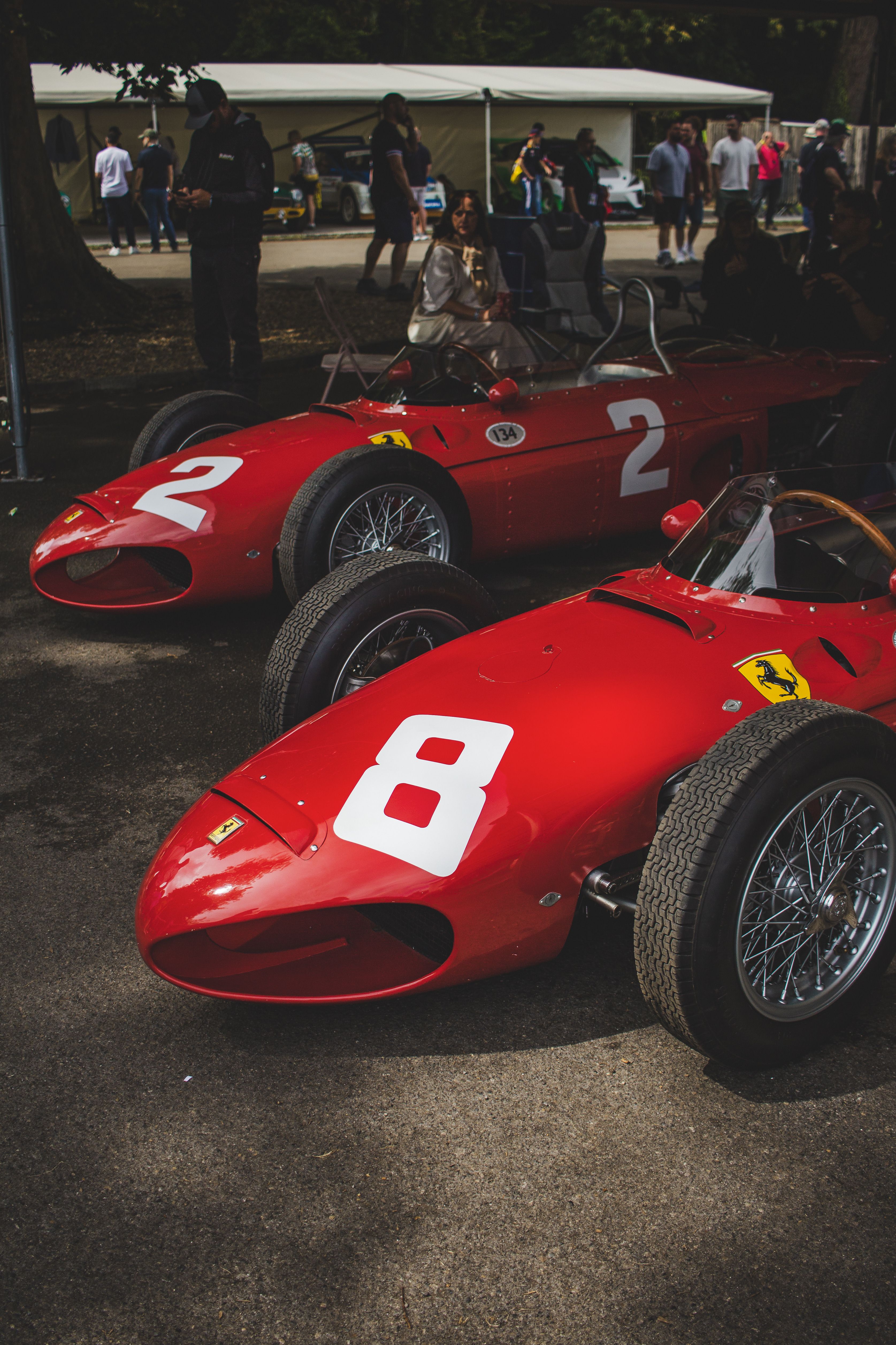 Two ferrari race cars parked next to each other · Free Stock Photo