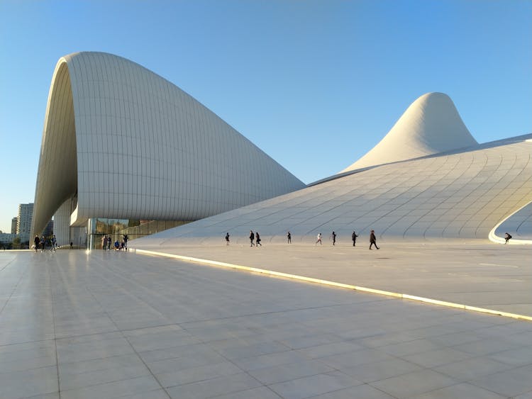 Photo Of People Walking Near Building