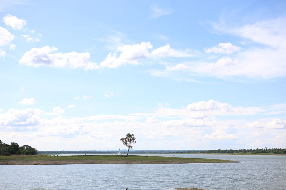 Serene island scene with clear skies in Popaywa, Myanmar. Ideal for travel and nature themes.