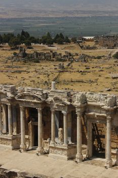 Explore the historic ruins of Hierapolis in Turkey, showcasing ancient Greek architecture.