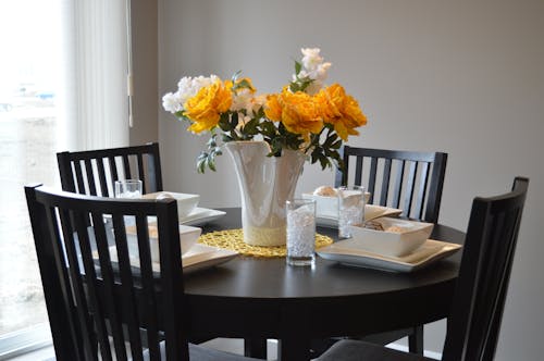 White Ceramic Vase on Dining Table