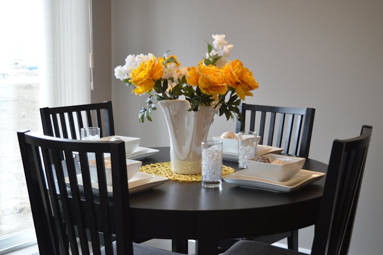 White Ceramic Vase On Dining Table