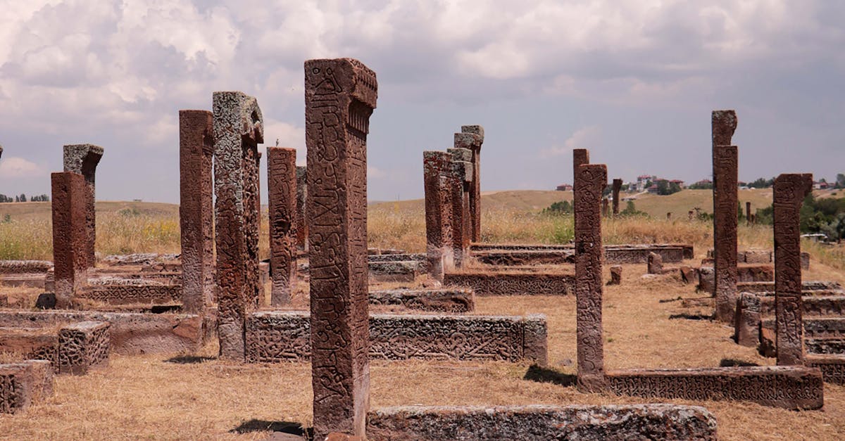 The ruins of a temple in the middle of a field