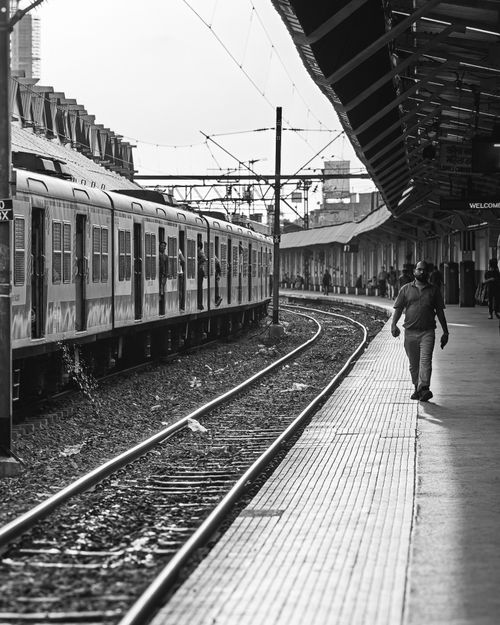 Free Black and white image of a busy train station in Howrah, India. Stock Photo