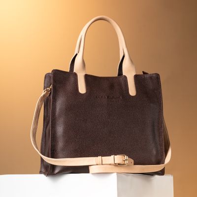 Structured leather tote with tan handles — photo by Jose Martin Segura Benites on Pexels
