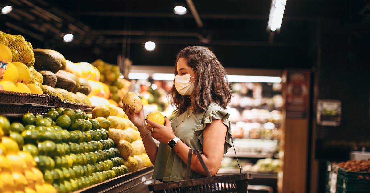 A woman wearing a face mask in a grocery store