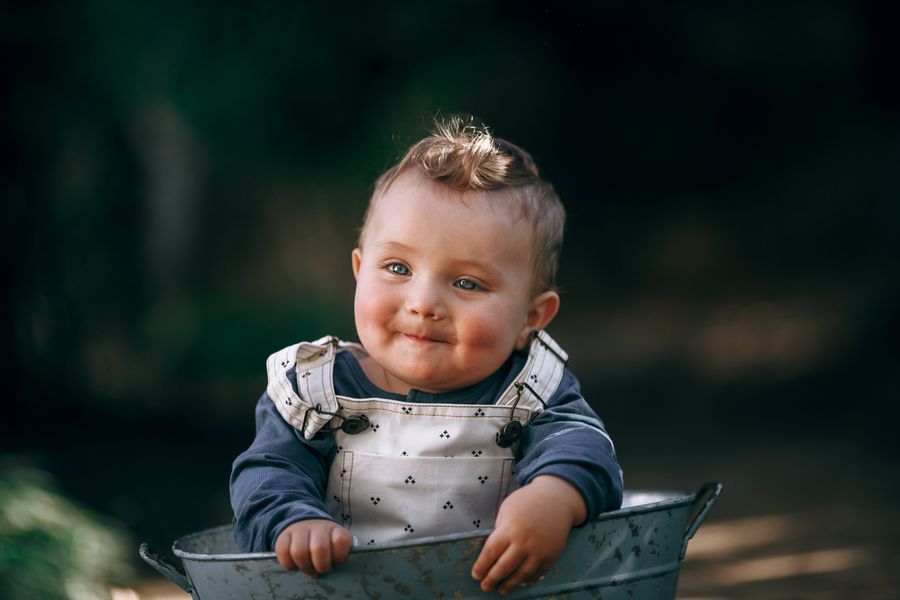 Cute chubby Indian baby girl smiling