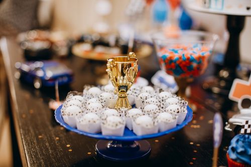 Free Colorful display of sweets and a trophy centerpiece at a festive event indoors. Stock Photo